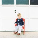 Boy in red chair in historic Knoxville neighborhood