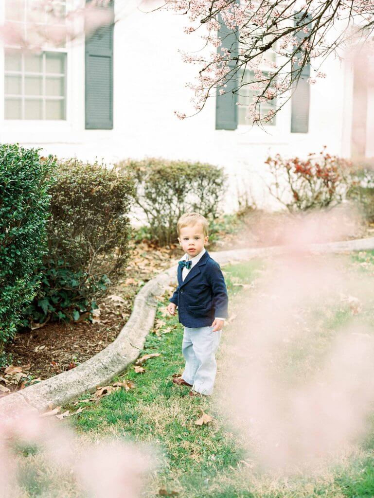 Boy in yard having Easter Portraits taken