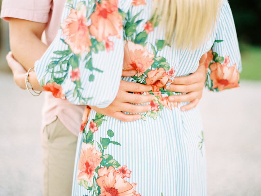 Bride and Groom showing Outfits for Engagement Photos