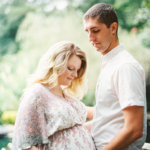 pregnant couple at the Gardens at Gray Gables Summerfield NC