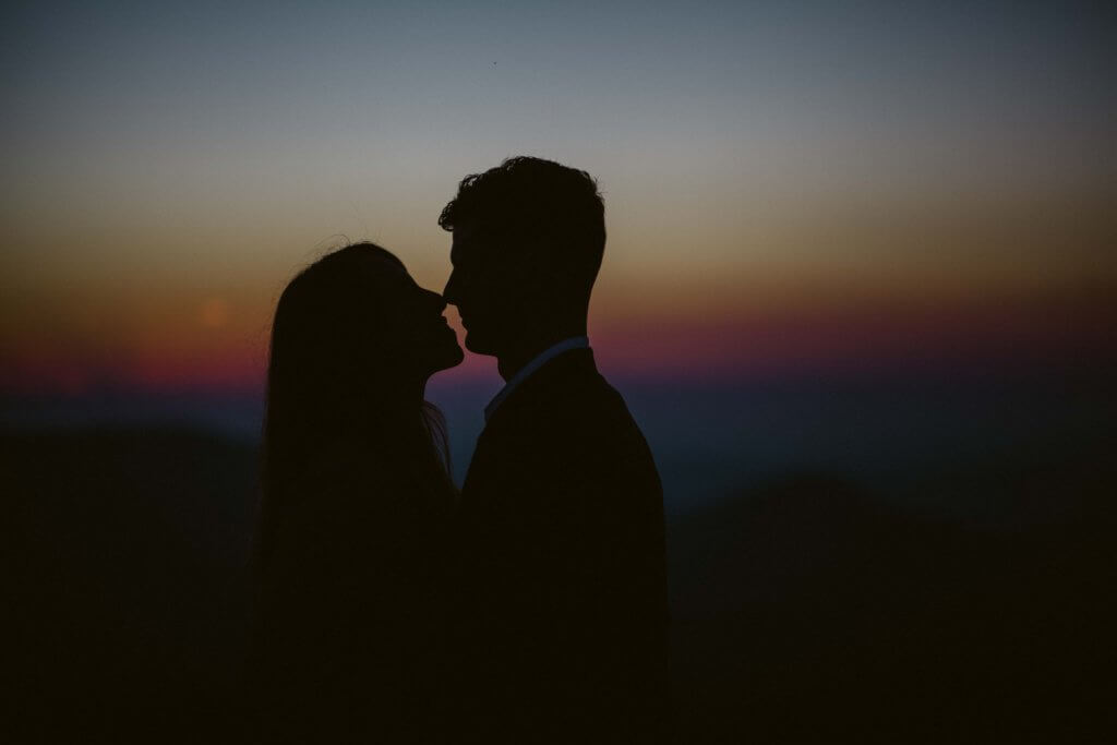Asheville Surprise Proposal Photographer capturing engaged couple on Max Patch