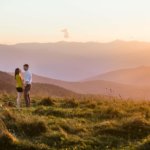 man and woman engaged on Max Patch Bald Mountain near Asheville NC